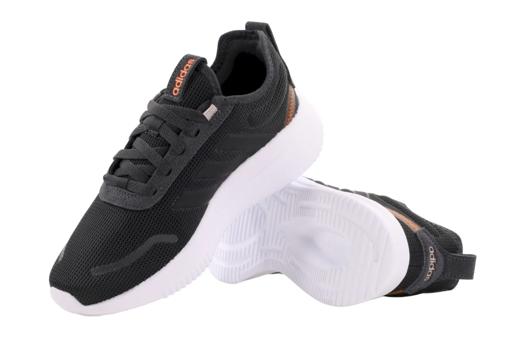 Black Adidas women's athletic shoes with white soles