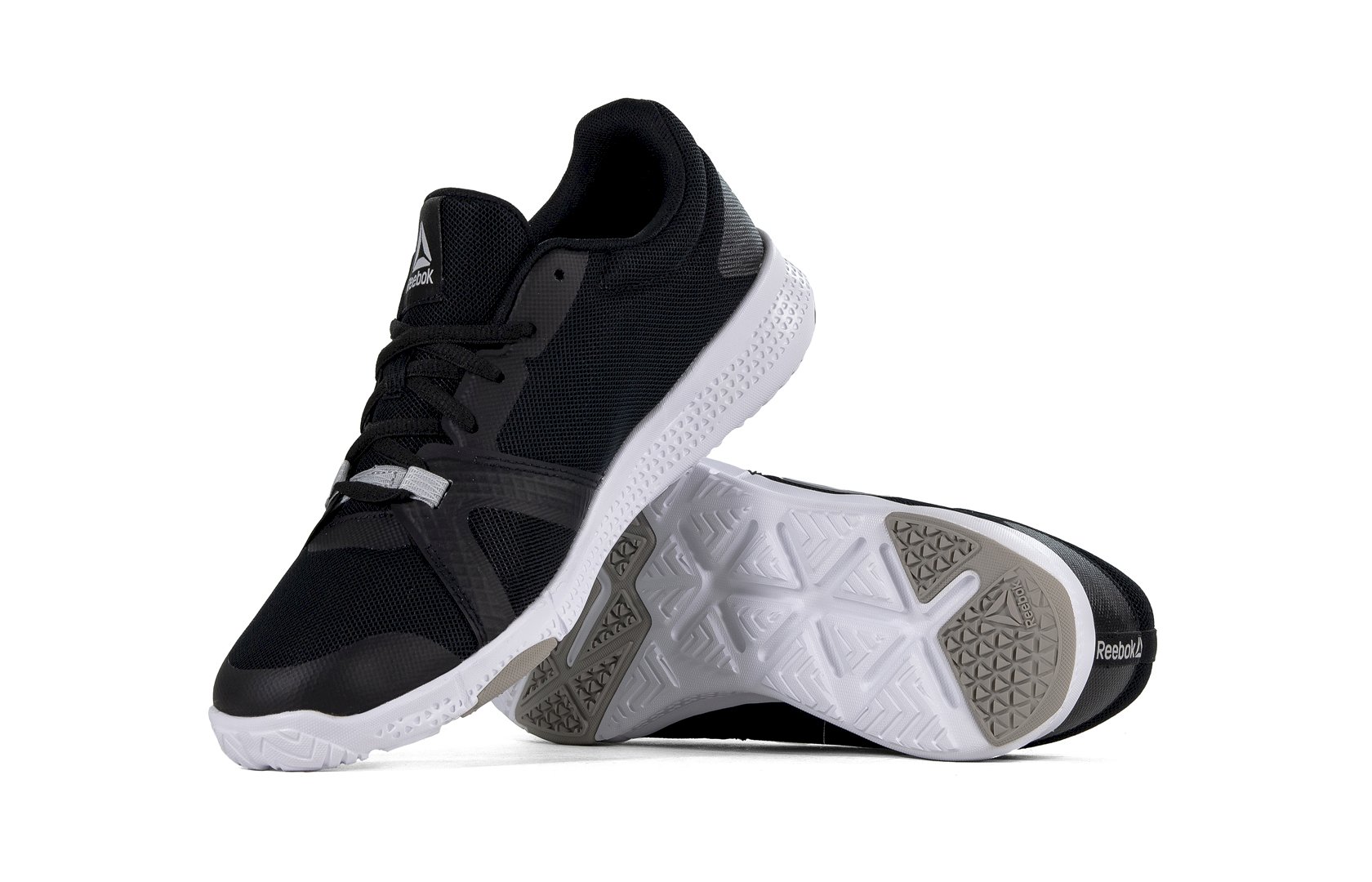 Sapatilhas pretas da Reebok para mulher, para o ginásio